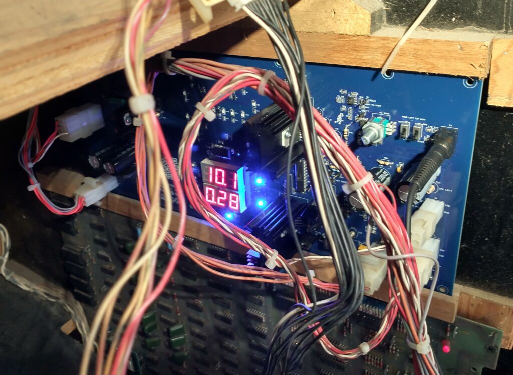 Alan-1 Audio Regulator II++ board installed inside of an Atari cabinet.